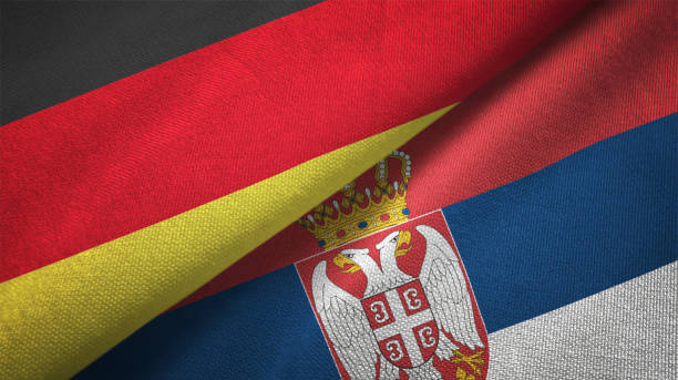 istock Serbia and Germany two flags together realations textile cloth fabric texture 1089737286