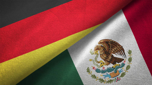 istock Mexico and Germany two flags together realations textile cloth fabric texture 1089737530