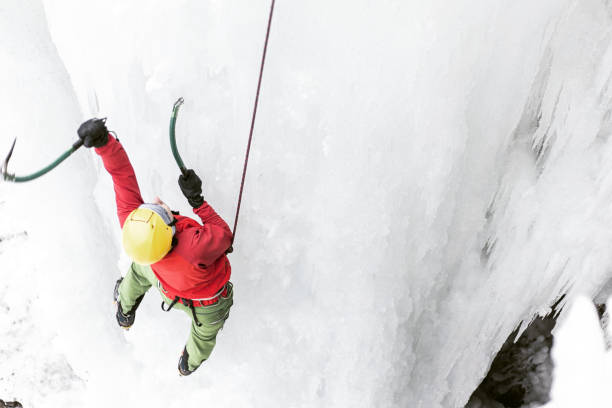 istock Ice climbing on a frozen waterfall. 1089738032