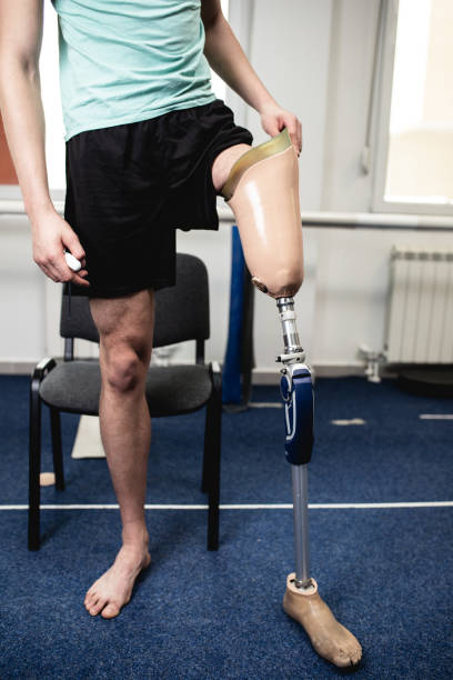 istock Disabled man at physiotherapy center 1089739726