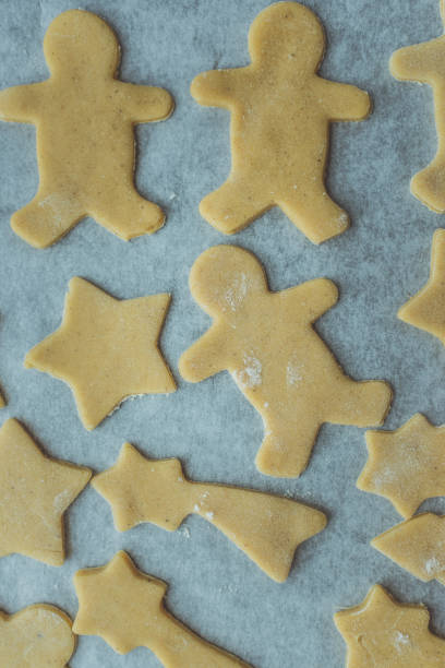 istock Baking cookies for Christmas. Cookies on baking sheet. Selective focus. 1089744906