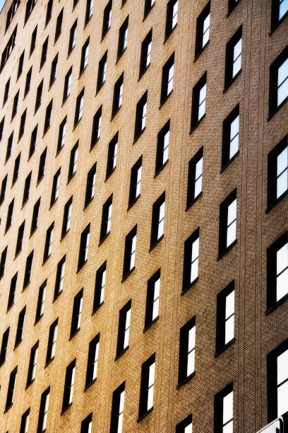 istock windows on the side of a brick building 1089752880