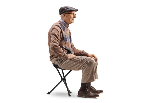 istock Senior man sitting on a picnic chair 1089757966