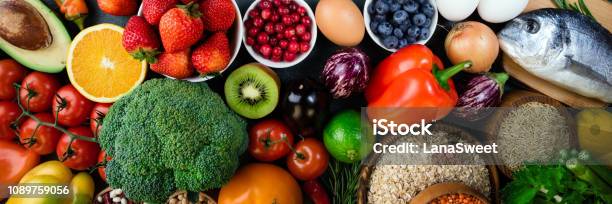 Background Healthy Food Fresh Fruits Vegetables Fish Berries And Cereals Healthy Food Diet And Healthy Life Concept Top View Stock Photo - Download Image Now
