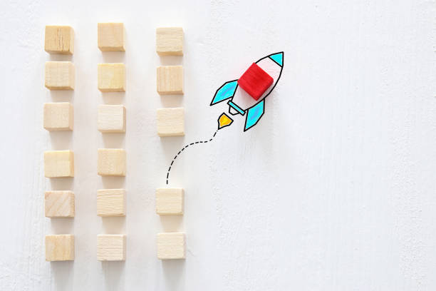 istock concept of think different, innovation and creativity. red cube changing direction from others. 1089759208