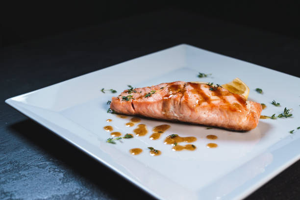 istock Tasty fresh salmon in white plate 1089760910