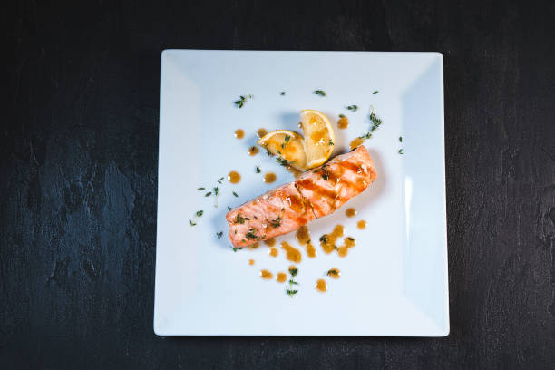 istock Tasty fresh salmon in white plate 1089760978