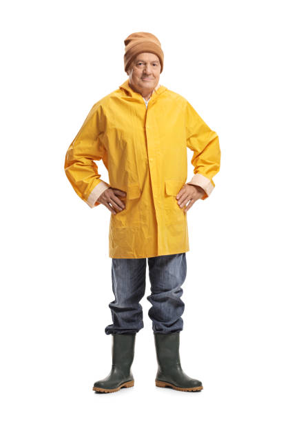 istock Mature man in a yellow raincoat 1089761340