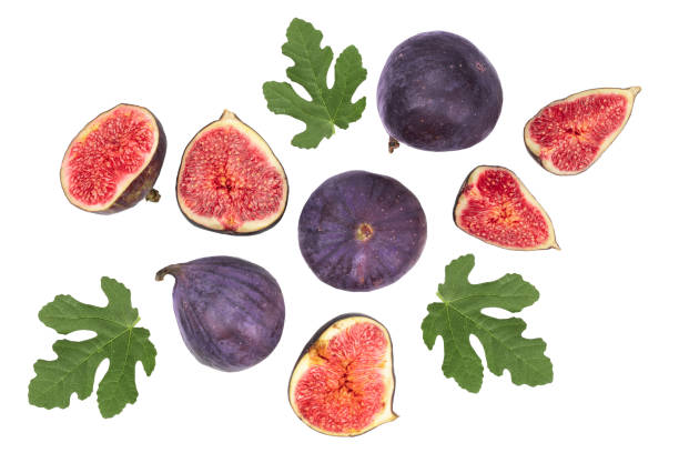 istock fig fruits with leaves isolated on white background. Top view. Flat lay pattern 1089765692