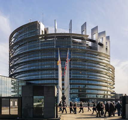 The Louise Weiss building, seat of the European Parliament, with tourists coming in, Strasbourg, France.