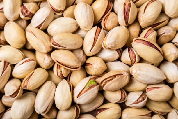 istock Pistachios nuts background. Pistachio texture 1089768322