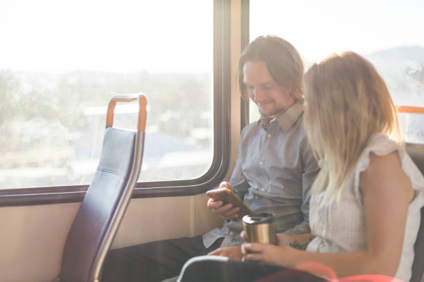 istock Business colleagues riding on public transit together 1089771068