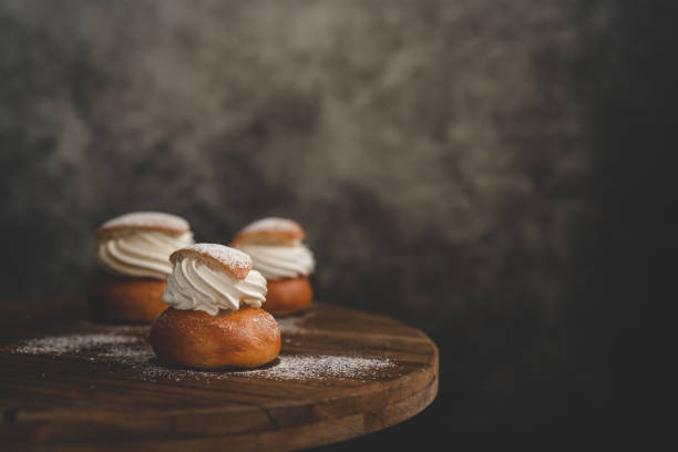 istock Traditional Swedish dessert Semla with whipped cream and sugar 1089775610