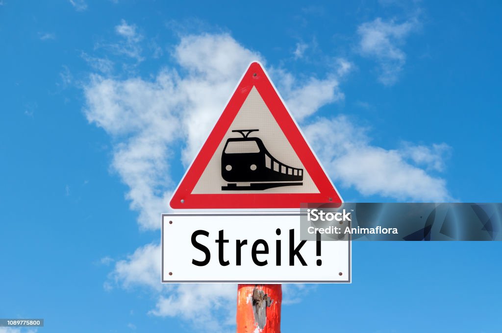 Attention railway strike sign Berlin Stock Photo