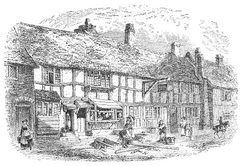 Shakespeare's Birthplace in Stratford-upon-Avon, Warwickshire, England as it looked in 1820. Most likely used to baptize Shakespeare as a baby from the Works of William Shakespeare. Vintage etching circa mid 19th century.