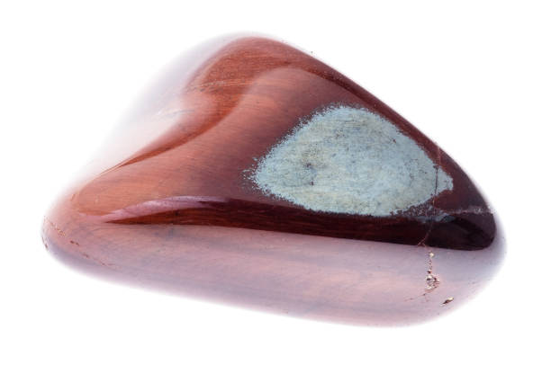 istock polished bull's eye (ox's eye) gemstone on white 1089782044