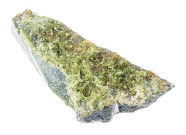 istock rough Vesuvianite crystals on rock on white 1089782136
