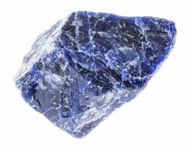 istock raw blue Sodalite stone on white 1089783916