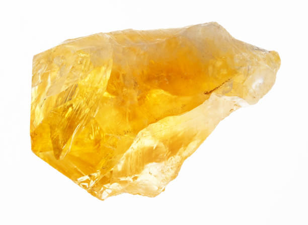 istock rough crystal of Citrine (yellow quartz) on white 1089783924