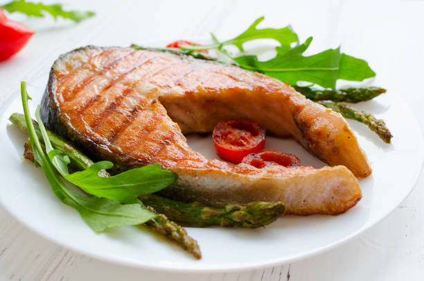 istock Grilled salmon steak with vegetables 1089787808