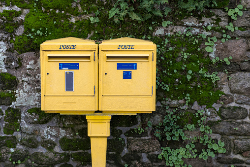 Two French letterboxes, with the word \