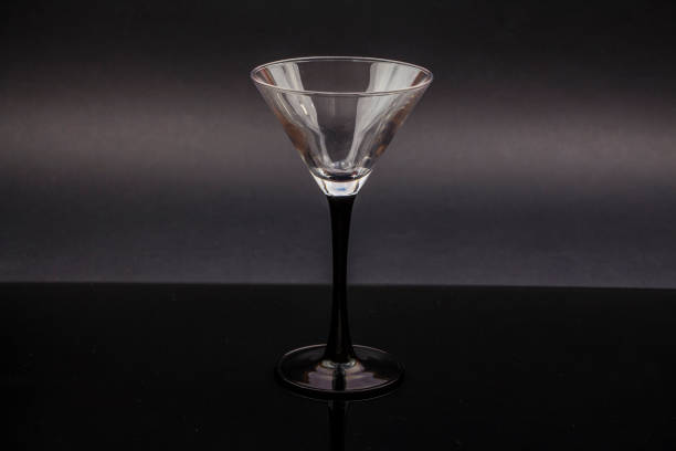 istock Empty martini glass, martini glasses on a black background. 1089796274