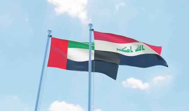 istock UAE and Iraq, two flags waving against blue sky 1089796400