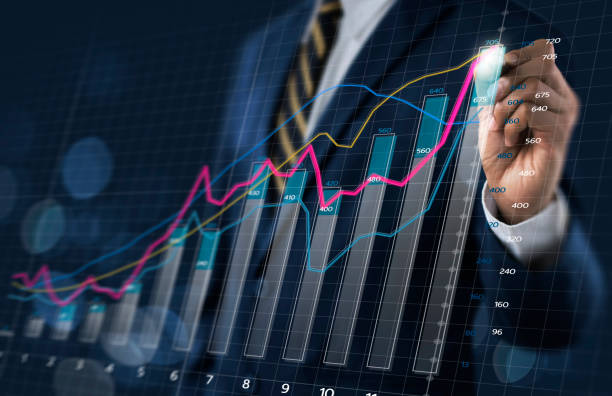 istock Business growth, progress or success concept. Businessman is drawing a growing 3d virtual hologram graph on dark tone background. 1089797542