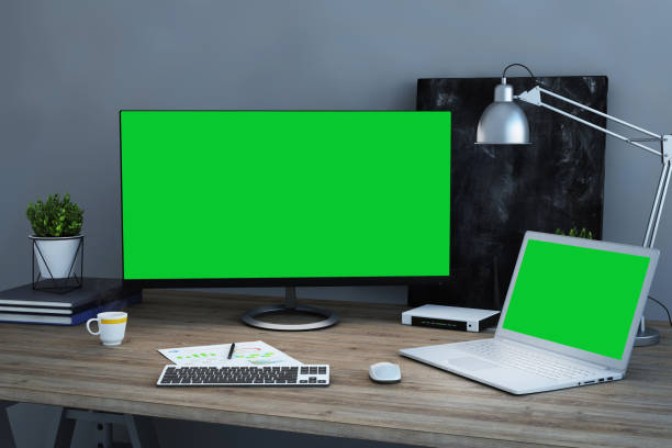 istock Office desk scenery with computer and laptop with blank screen mock-up 1089797768