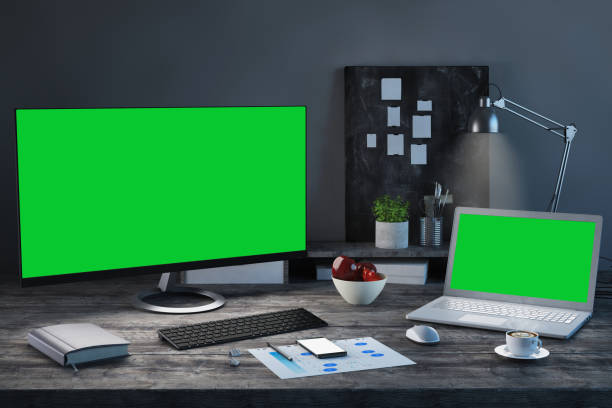 istock Office desk scenery with computer and laptop with blank screen mock-up 1089797816