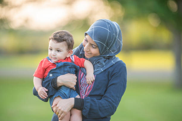 istock Mom Holding Son 1089798272