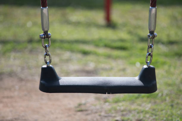 istock Swing in children's park 1089800026