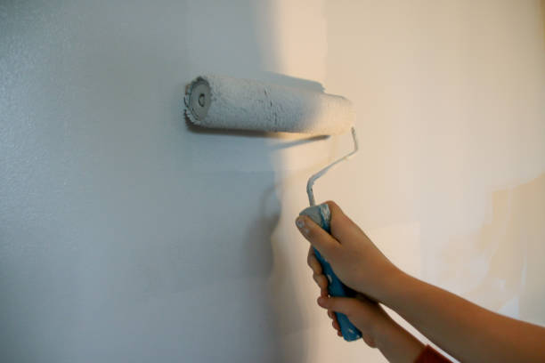 istock Teaching a child to paint in home renovations 1089809818