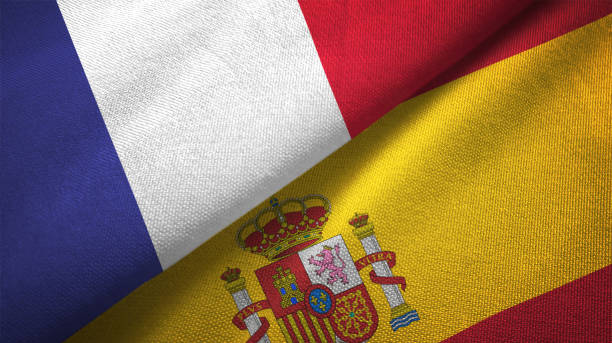 istock Spain and France two flags together realations textile cloth fabric texture 1089810592