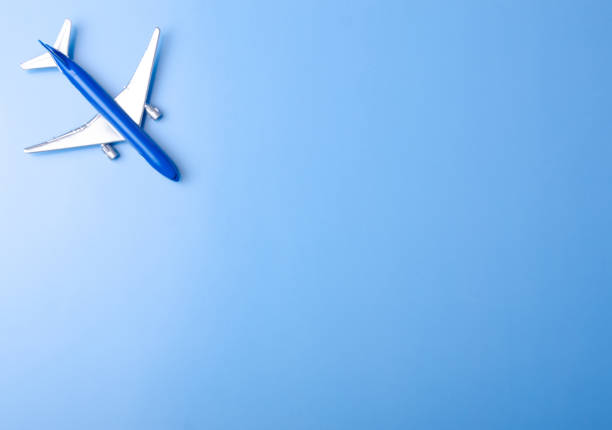 istock Blue model plane,airplane on color blue background 1089814118