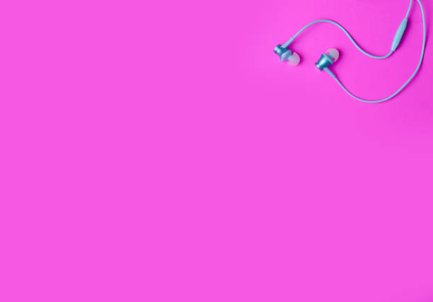 istock Headphones on color pink background 1089815342
