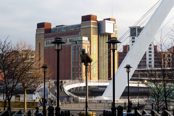Newcastle, England. January 4, 2019. View of the Gateshead Millennium Bridge with the Baltic Centre for Contemporary Arts in the horizon.