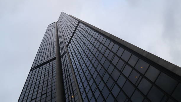istock Vast Skyscraper against a menacing gray sky 1089817142