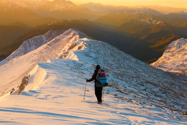 istock A man in mountain sunset winter. Unique. Christmas 1089818864