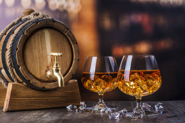 istock Two glasses of Cognac with ice cubes 1089818922