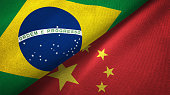China and Brazil two flags together realations textile cloth fabric texture
