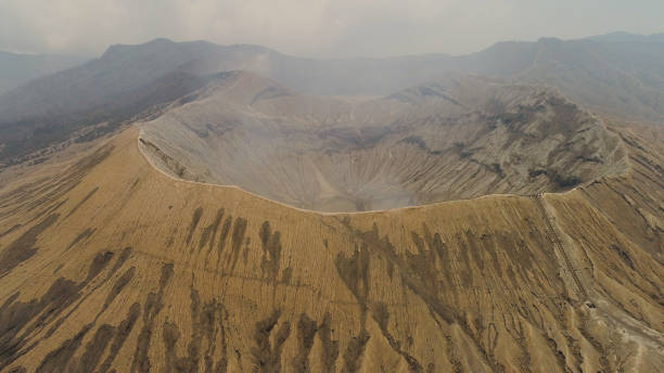 istock mountain landscape with an active volcano 1089825786