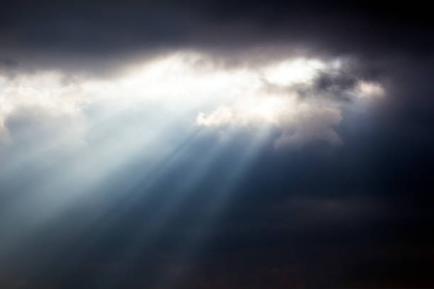 istock rays of the sun beautifully make their way through the clouds 1089828260