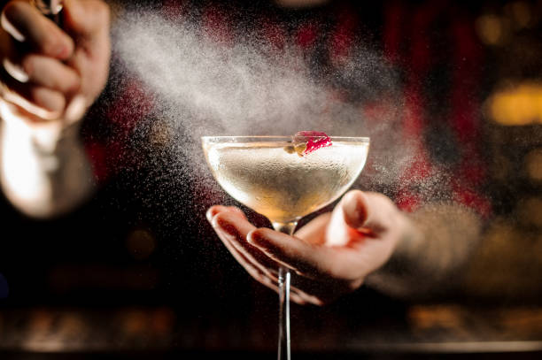 istock Barman splashing bitter on the elegant cocktail glass 1089829534