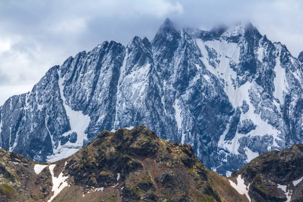istock mountain ridge in a snow 1089831722