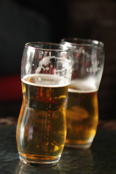 istock Two glasses of light beer 1089832020