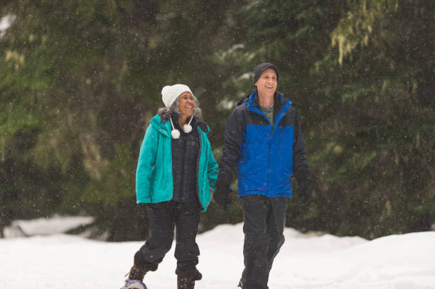 istock A senior couple snowshoeing in the forest 1089832200