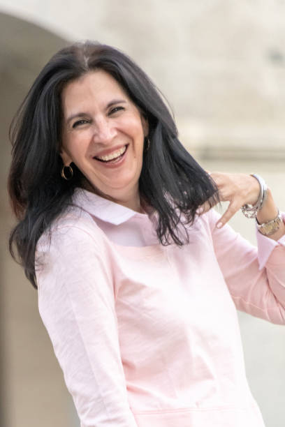 istock Smiling mature woman looking at the camera 1089833956