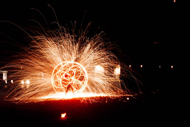 Round frame made of sparkler trace. You can add your message inside. Isolated on black.