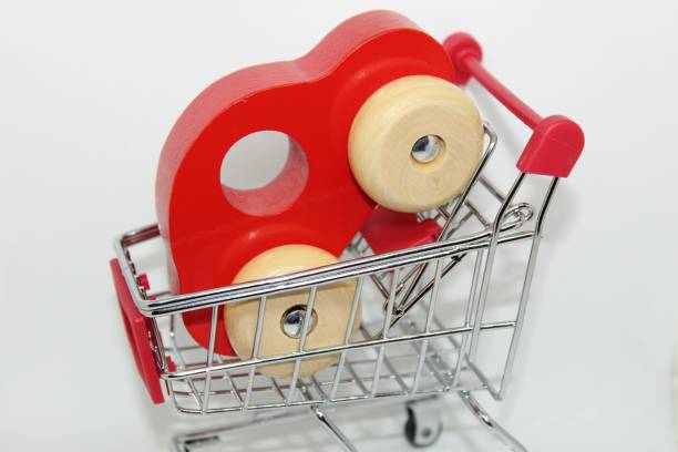 istock Shopping cart and car in it. 1089840542